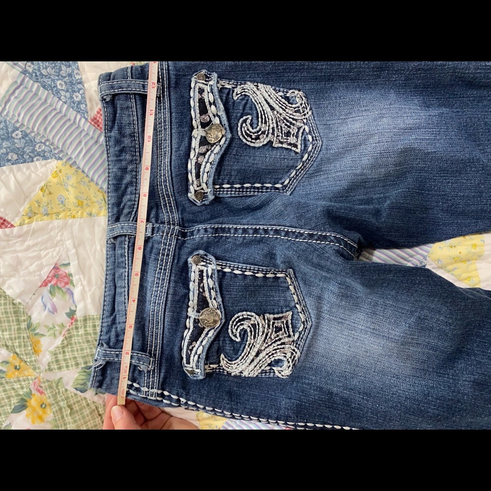 Rock Revival Bootcut Bell Bottom or Flare Bottom fitted jeans. Size 25” Miss Me